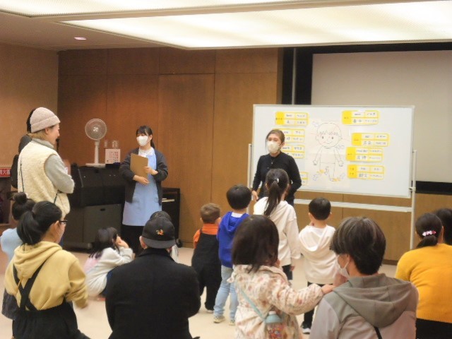 Parents and children singing together