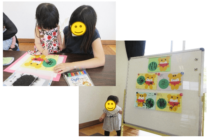 左:季節の壁面を作る園児と保護、右:作った壁面と並ぶ園児