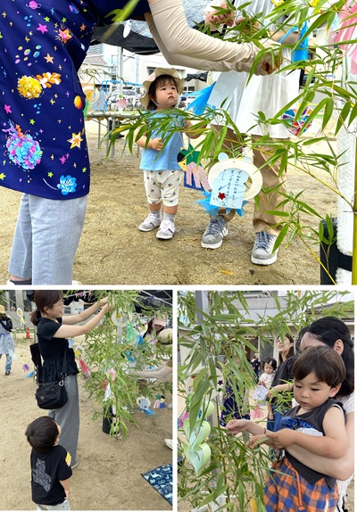 笹に飾りをつける子どもたち